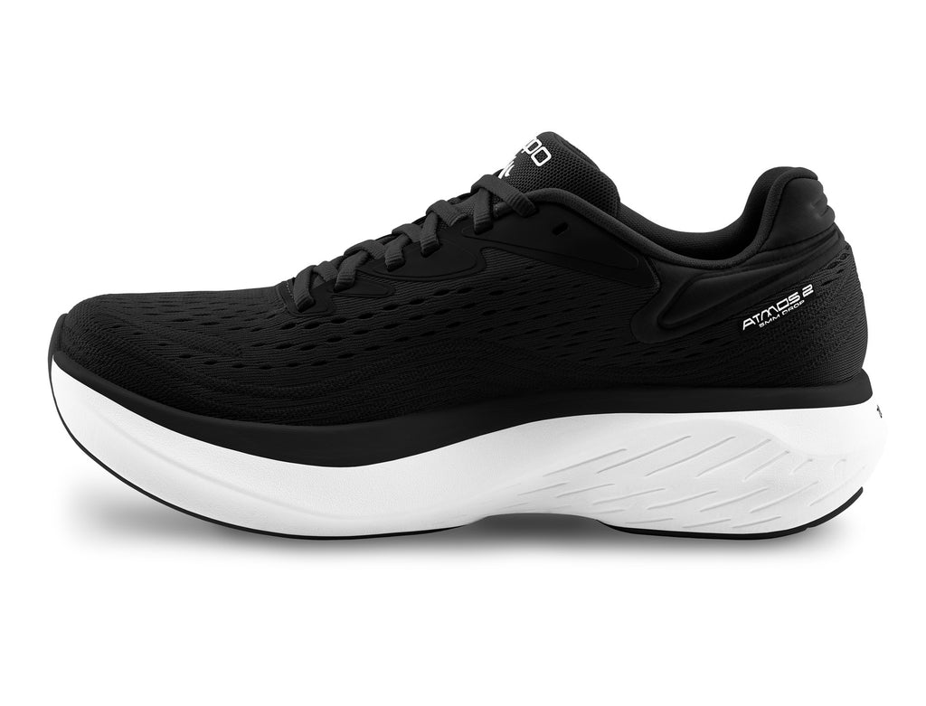 Women's Topo Atmos 2. Black upper. White midsole. Medial view.