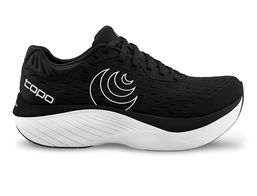 Women's Topo Atmos. Black upper. White midsole. Lateral view.