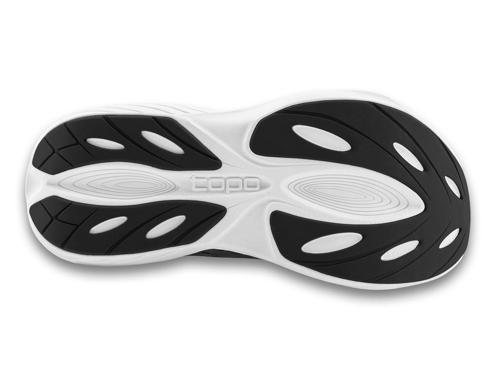 Women's Topo Atmos. Black upper. White midsole. Bottom view.