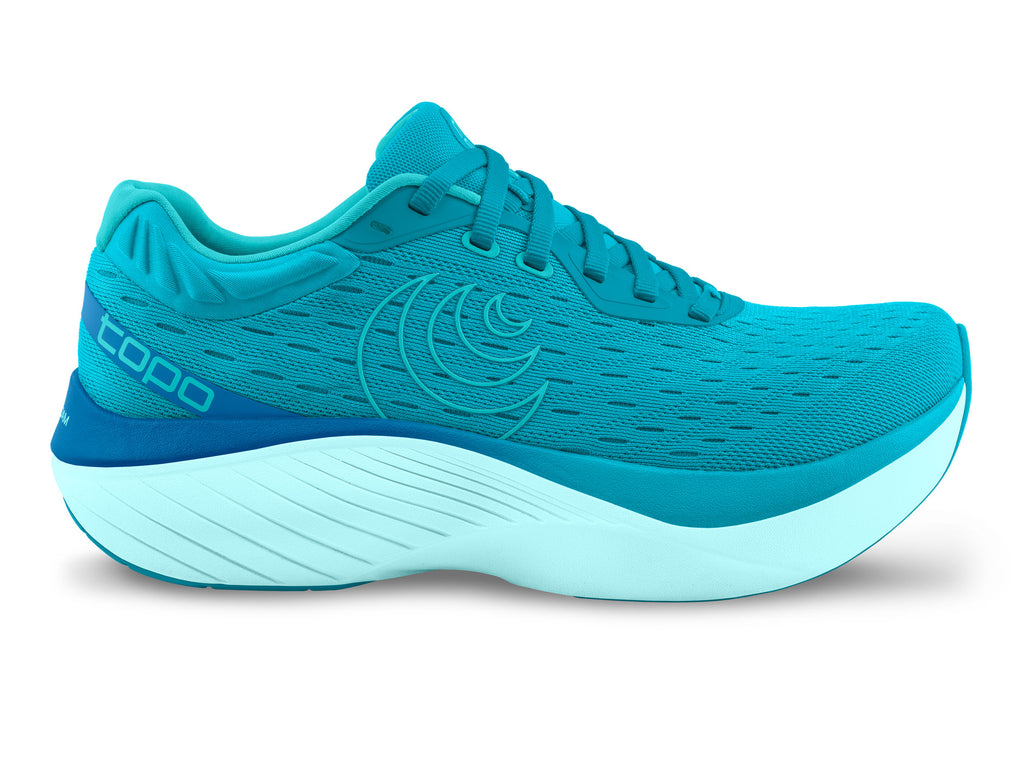 Women's Topo Athletic Atmos. Light blue upper. White midsole. Lateral view.