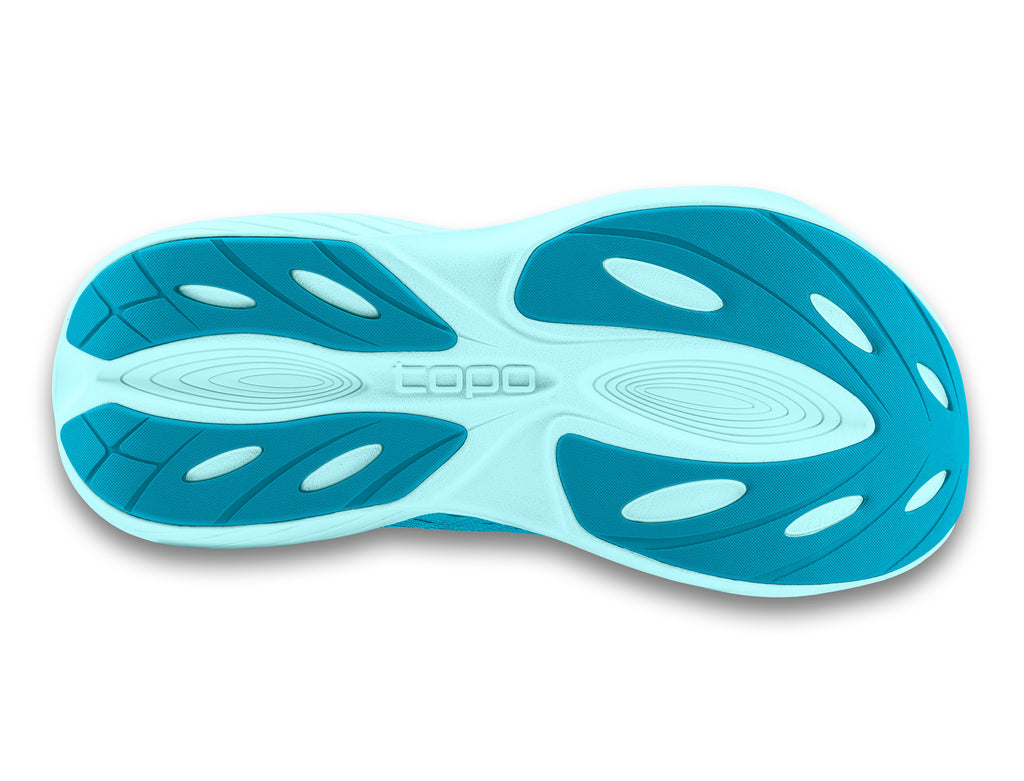 Women's Topo Athletic Atmos. Light blue upper. White midsole. Bottom view.