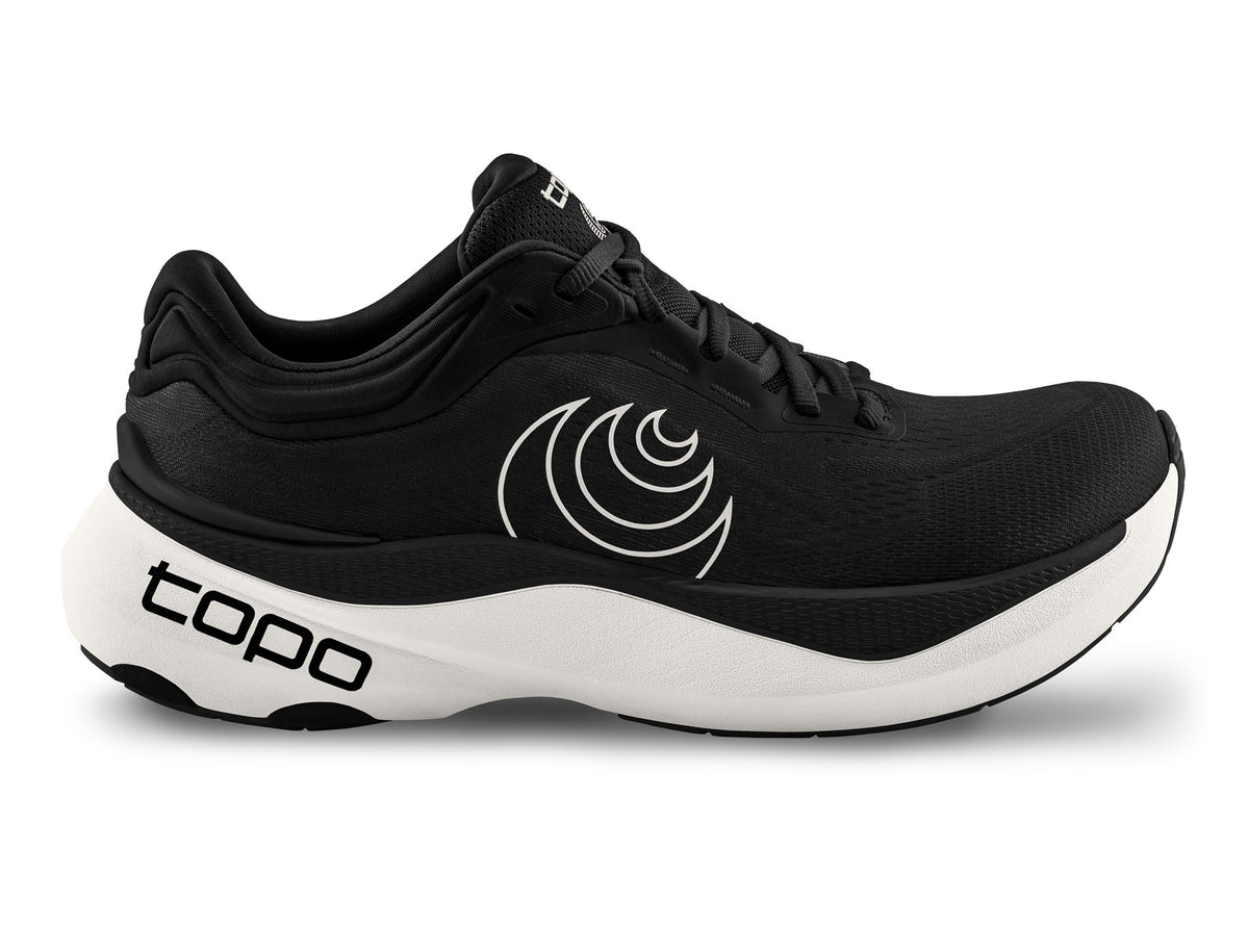 Women's Topo Aura 2. Black upper. White midsole. Lateral view.