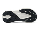 Women's Topo Aura 2. Black upper. White midsole. Bottom view.