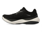 Women's Topo Aura 2. Black upper. White midsole. Medial view.