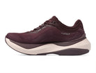 Women's Topo Aura 2. Maroon upper. White midsole. Medial view.