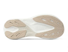 Women's Topo Aura 2. Tan upper. White midsole. Bottom view.
