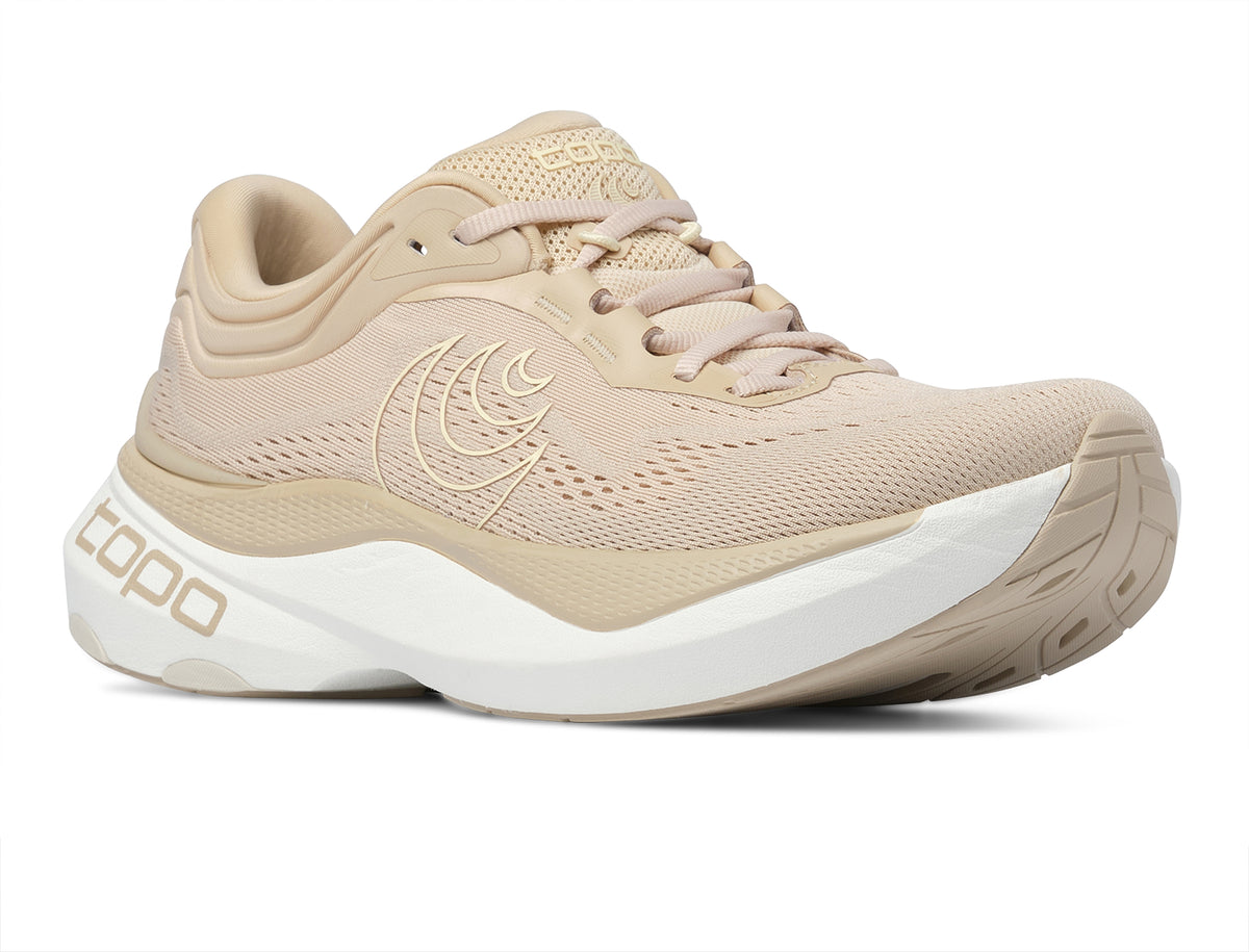 Women's Topo Aura 2. Tan upper. White midsole. Lateral view.