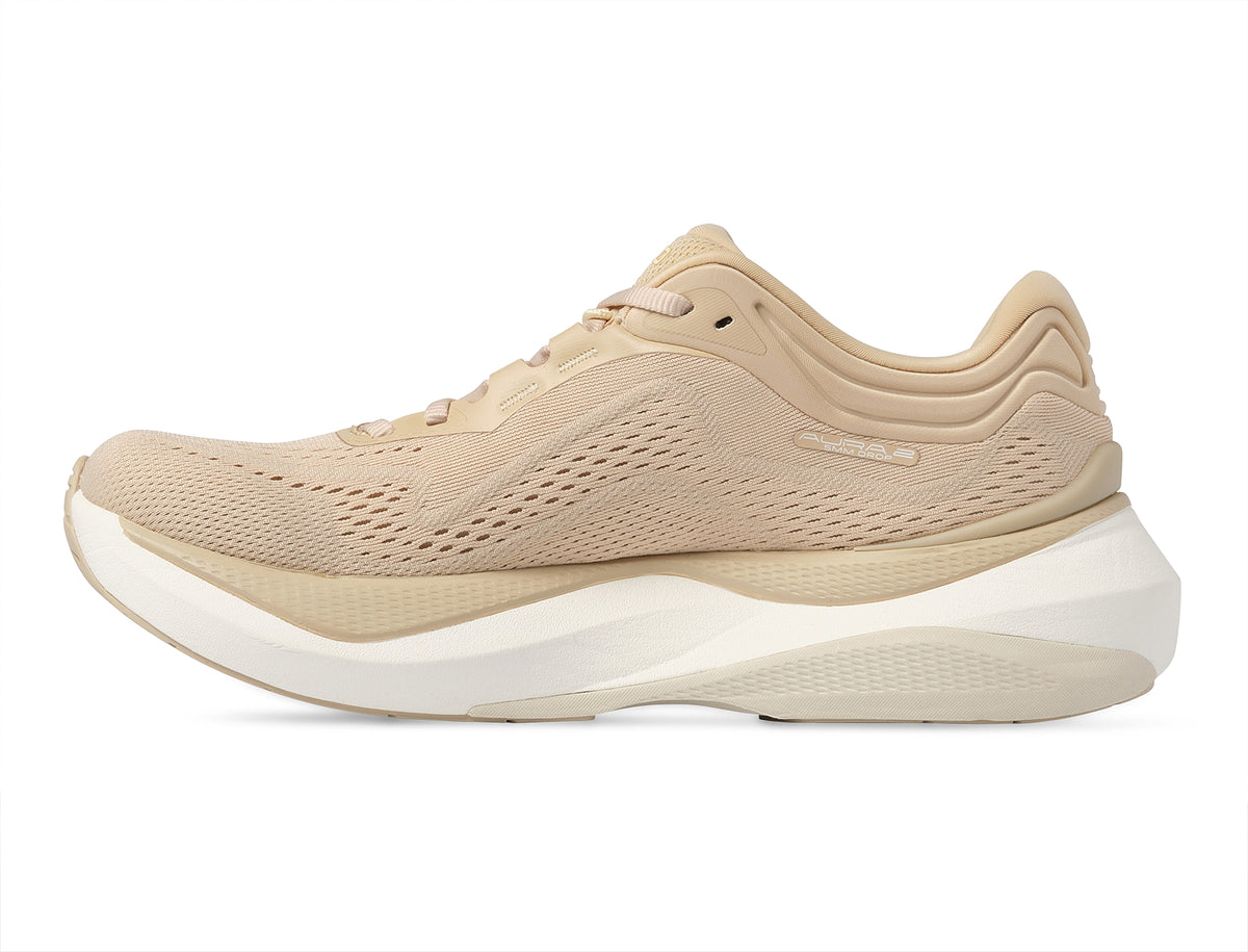 Women's Topo Aura 2. Tan upper. White midsole. Medial view.