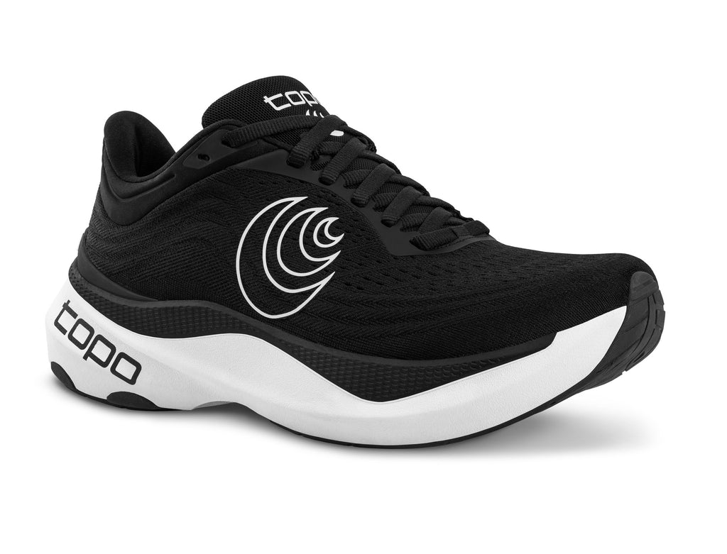 Women's Topo Aura. Black upper. White midsole. Lateral view.