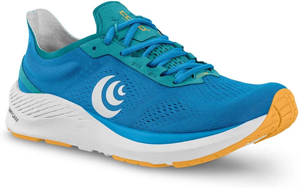 Women's Topo Athletic Cyclone. Blue upper. White midsole. Gold highlights. Lateral view.