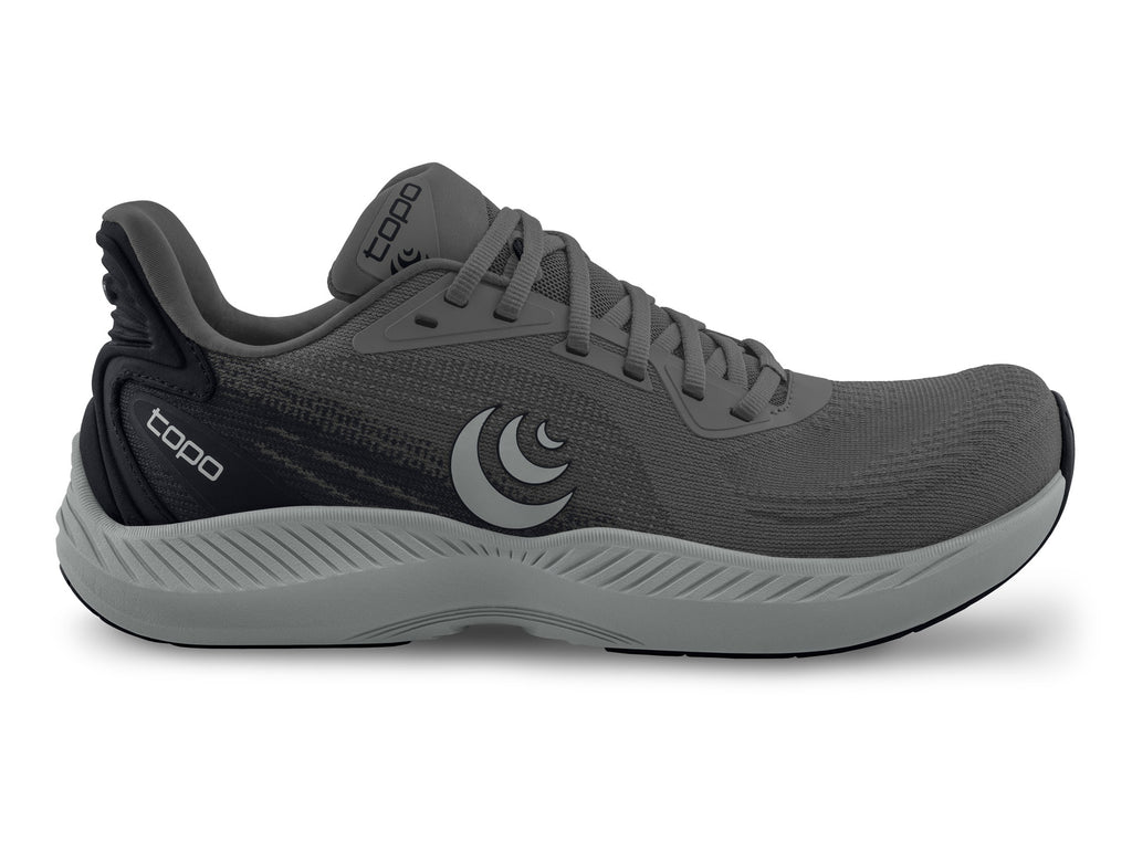 Women's Topo Fli-Lyte 6. Dark Grey upper. Grey midsole. Lateral view.