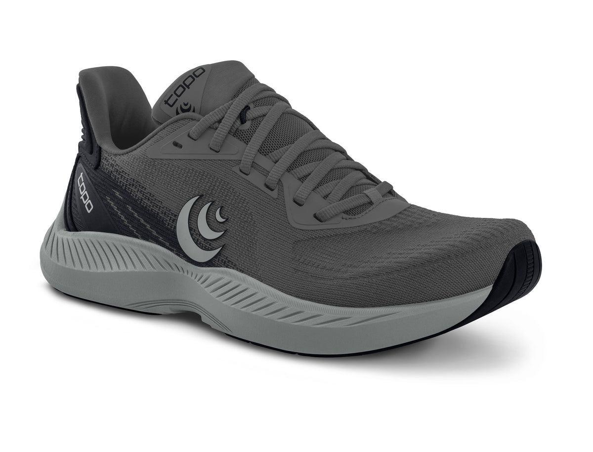 Women's Topo Fli-Lyte 6. Dark Grey upper. Grey midsole. Lateral view.