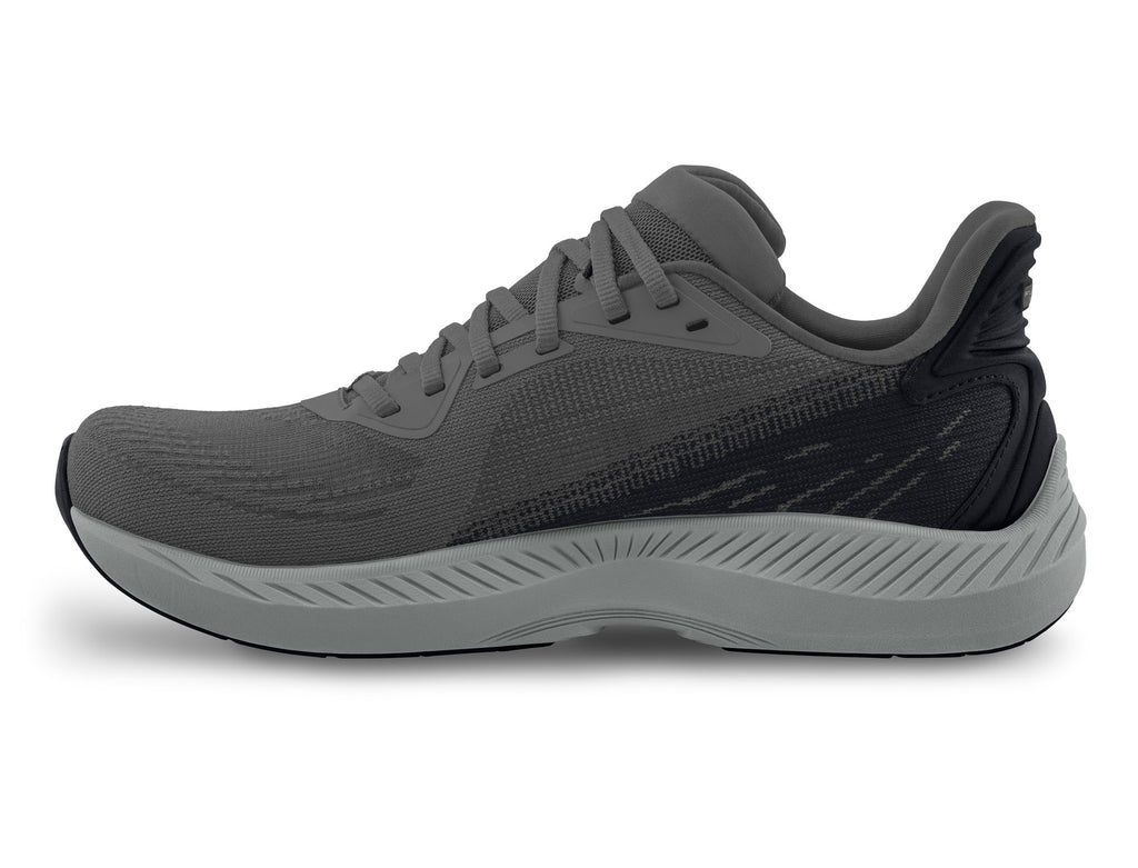 Women's Topo Fli-Lyte 6. Dark Grey upper. Grey midsole. Medial view.