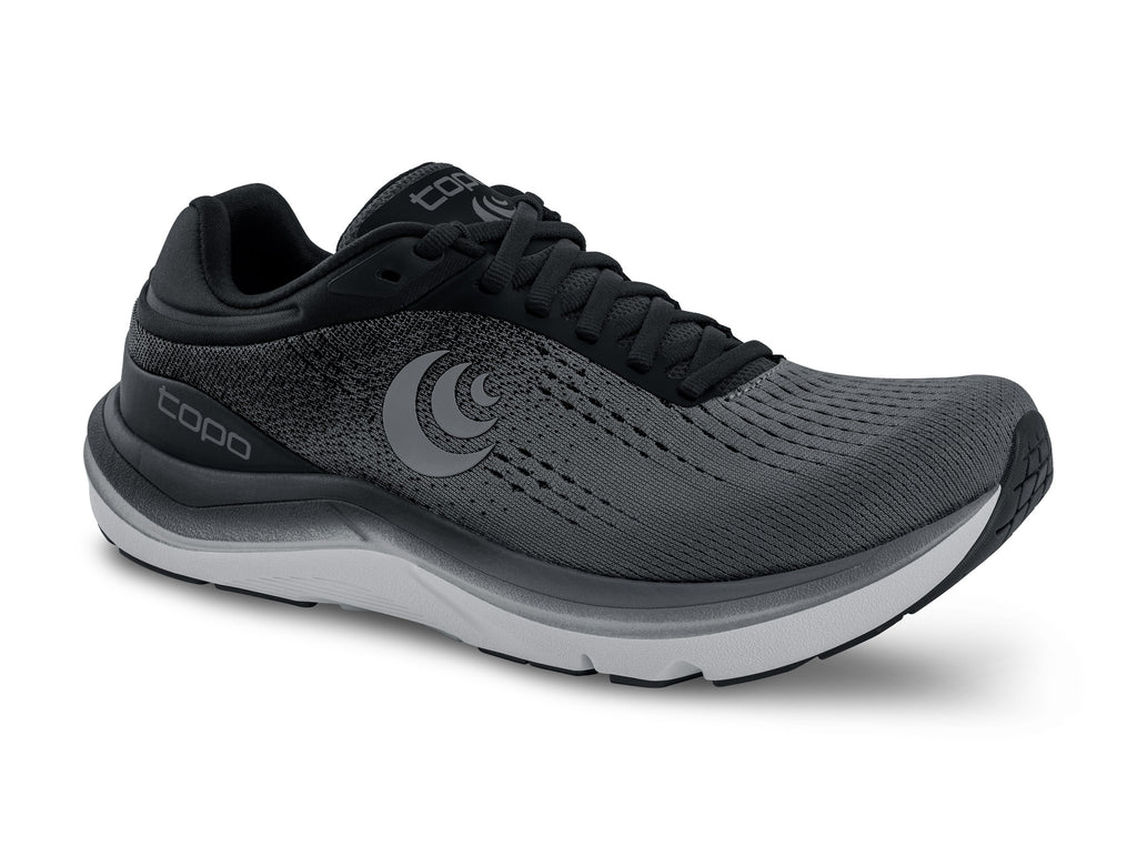 Women's Topo Magnifly 5. Black/Grey upper. Grey midsole. Lateral view.
