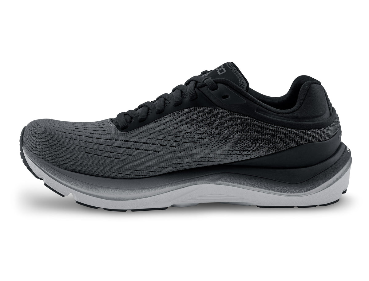 Women's Topo Magnifly 5. Black/Grey upper. Grey midsole. Medial view.