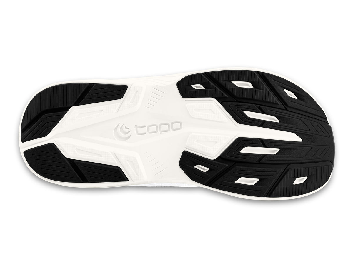 Women's Topo Magnifly 6. White upper. White midsole. Bottom view.