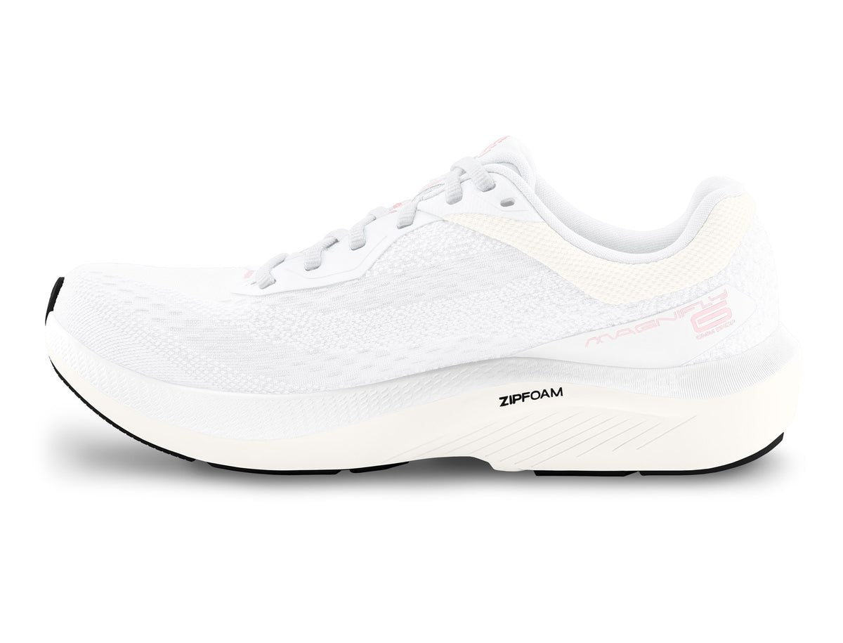 Women's Topo Magnifly 6. White upper. White midsole. Medial view.