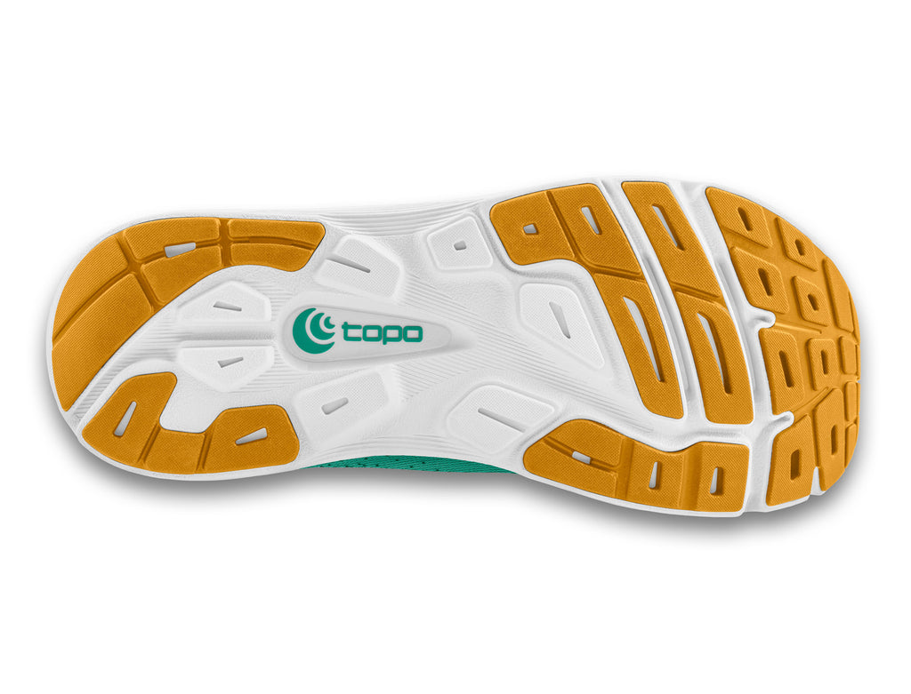 Women's Topo Magnifly 5. Green upper. White midsole. Bottom view.