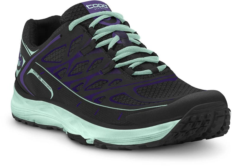 Women's Topo Athletic Black upper. Light blue midsole. Lateral view.