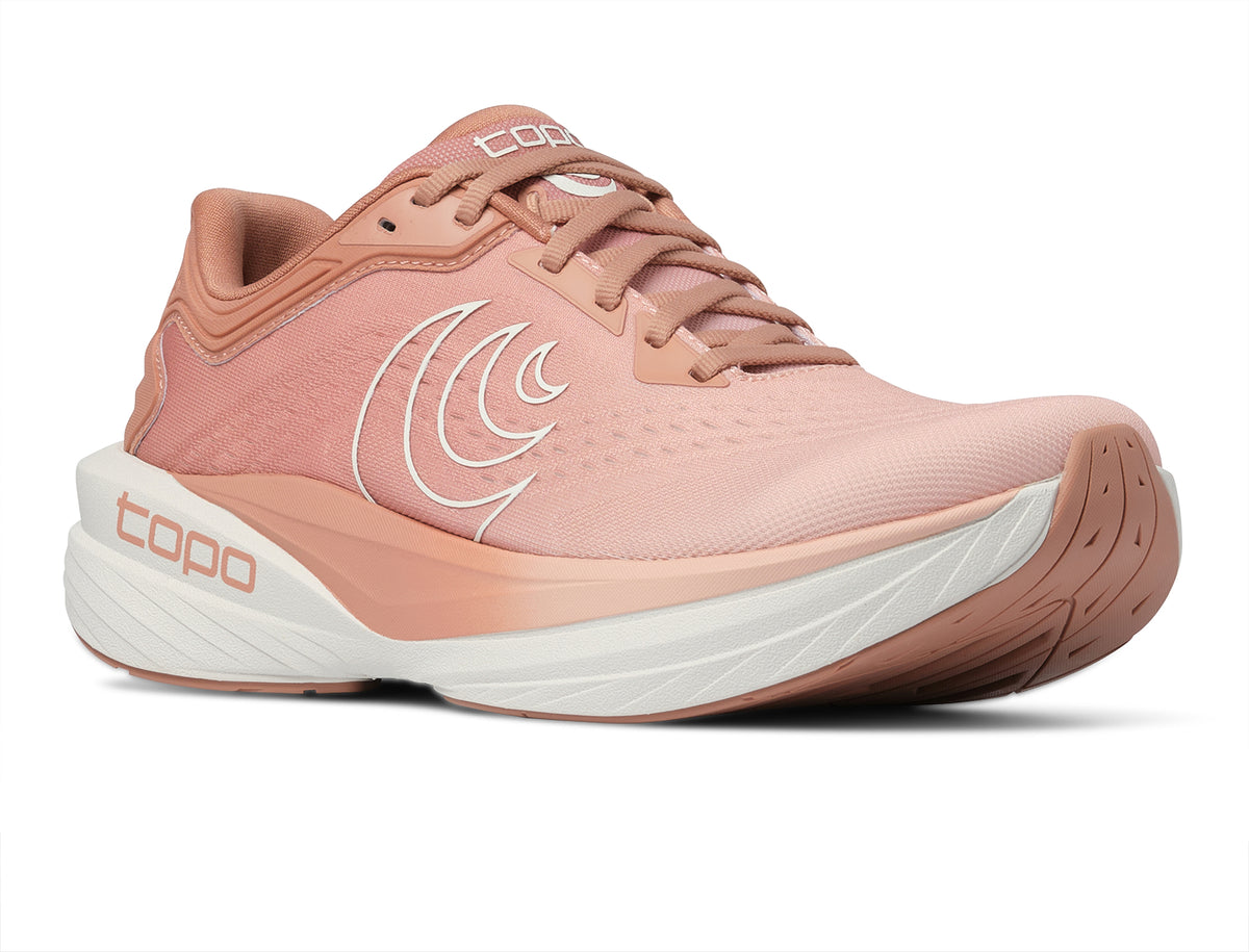 Women's Topo Phantom 4. Pink upper. White midsole. Lateral view.