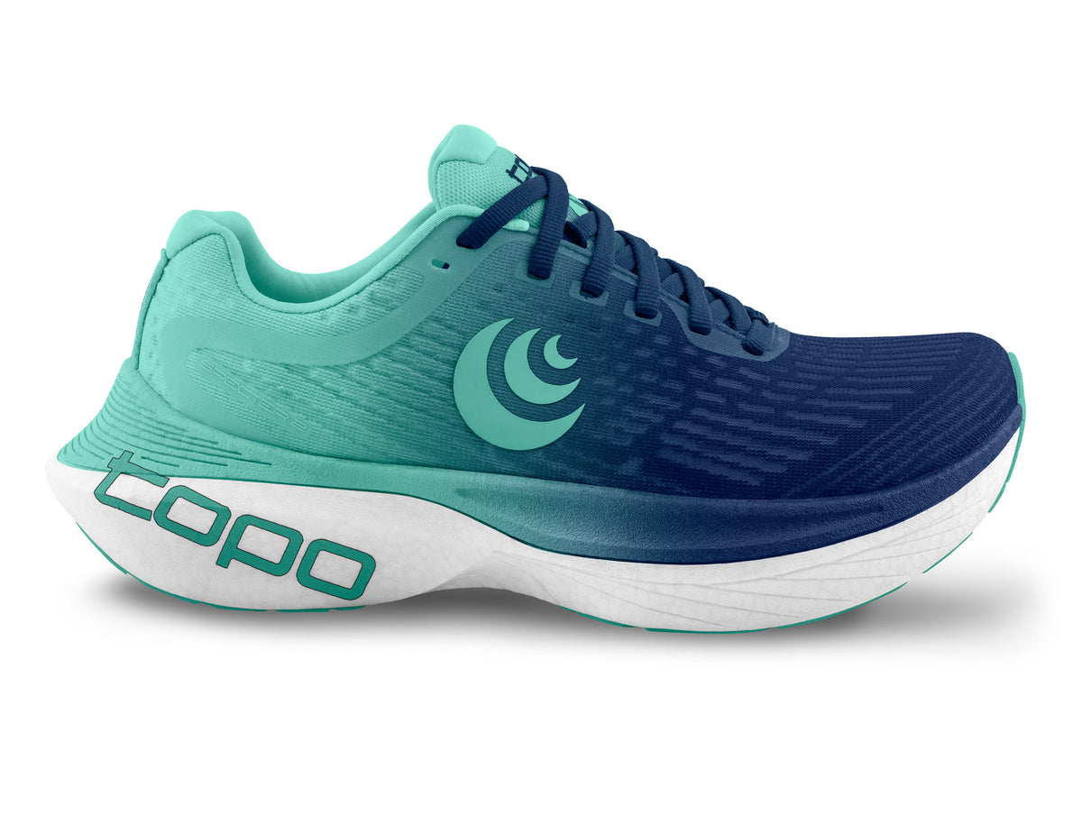 Women's Topo Specter 2. Blue Green upper. White midsole. Lateral view.