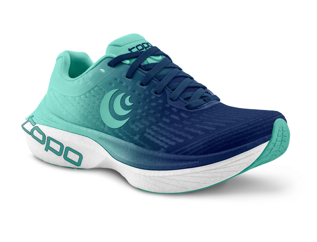 Women's Topo Specter 2. Blue Green upper. White midsole. Lateral view.