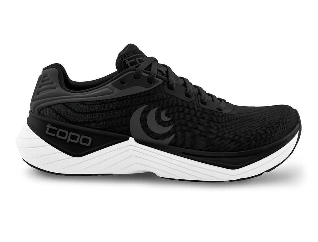 Women's Topo Ultrafly 5. Black upper. White midsole. Lateral view.