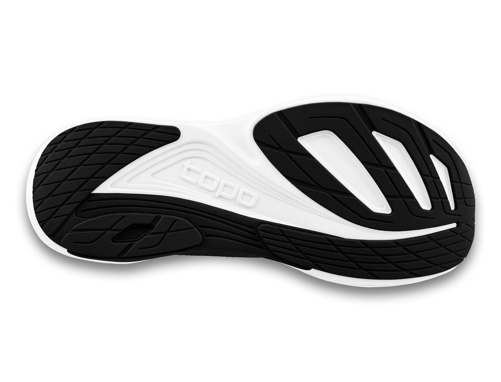 Women's Topo Ultrafly 5. Black upper. White midsole. Bottom view.