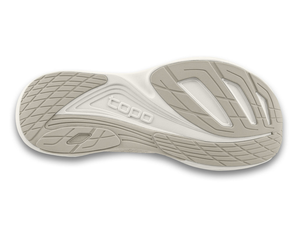 Women's Topo Ultrafly 5. Tan upper. White midsole. Bottom view.