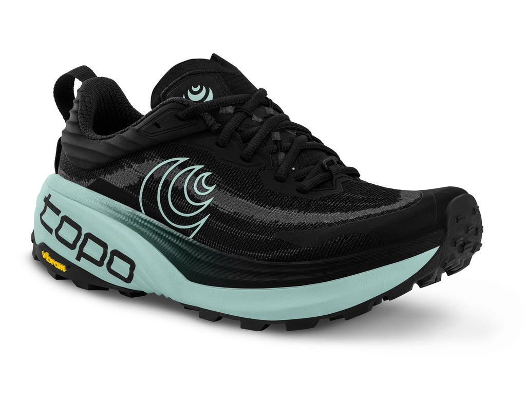 Women's Topo Vista. Black upper. Green midsole. Lateral view.