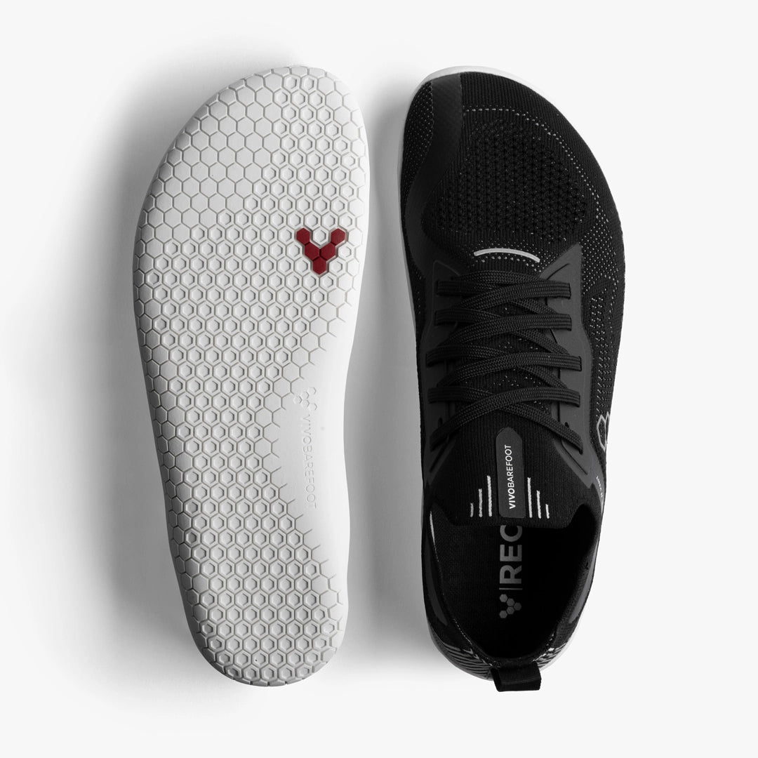 Women's Vivobarefoot Primus Lite Knit. Black upper. White outsole. Top/Bottom view.