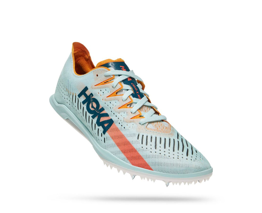 Hoka Cielo X MD Spikes. White upper. White midsole. Lateral view.