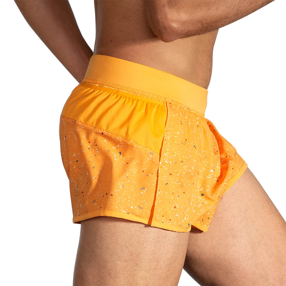 Men's Brooks Sherpa 3" Split Shorts. Orange. Lateral view.