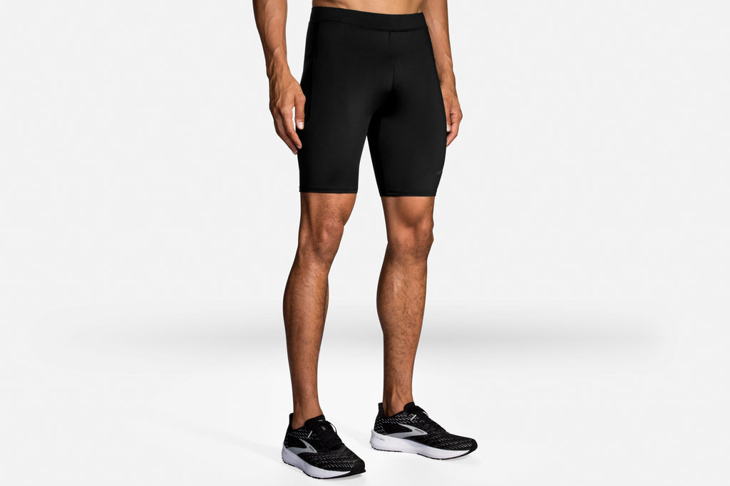 Men's Brooks Source 9" Short Tights. Black. Front/Lateral view.