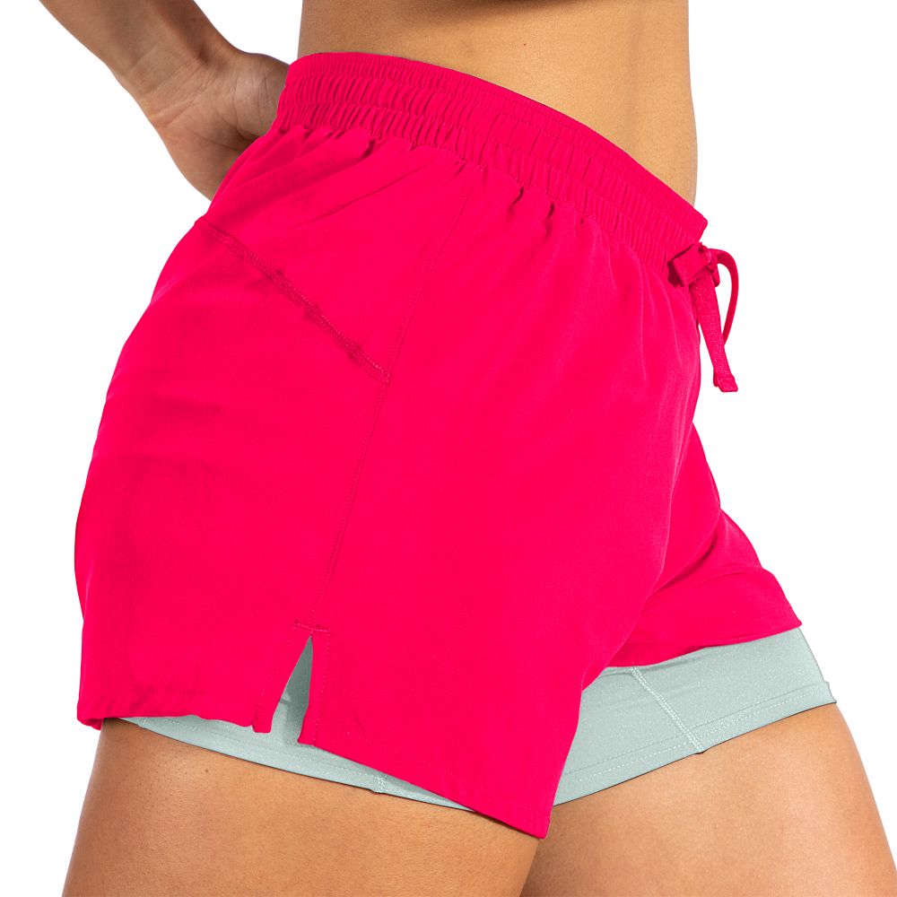 Women's Brooks Moment 5" 2-in-1 Shorts. Pink. Lateral view.