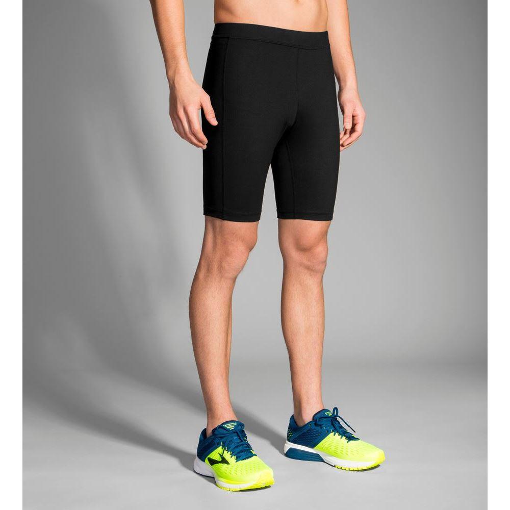 Men's Brooks Greenlight 9" Short Tights. Black. Front/Lateral view.