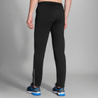 Men's Brooks Spartan Pants. Black. Rear/Lateral view.
