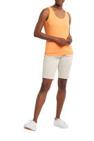 Tribal women's Wear 2 Ways Jersey Tank in Papaya, worn with the scoop neckline at the front.