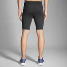 Men's Brooks Greenlight 9" Short Tights. Black. Rear view.