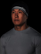 Unisex Nathan Hypernight Beanie. Black. Front/Lateral view.