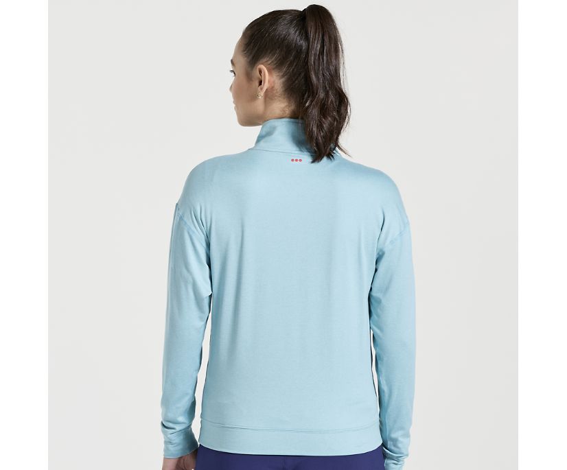 Women's Saucony Sunday 1/4 Zip. Light Blue. Rear view.