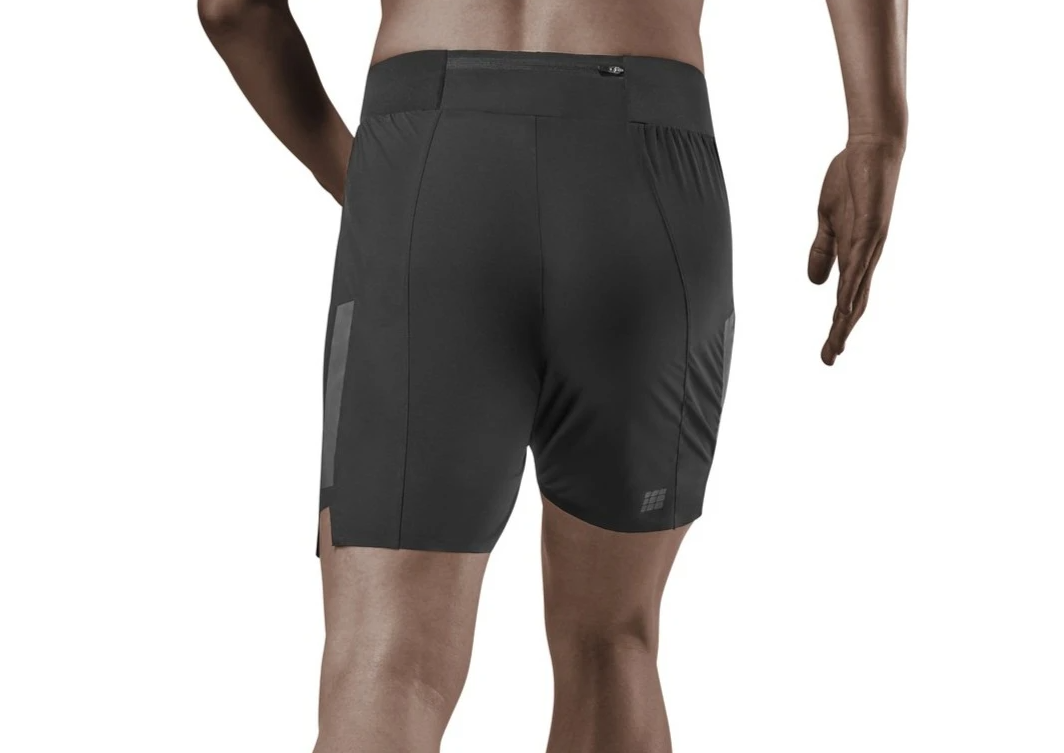 Men's CEP Loose Fit Shorts. Black. Rear view.