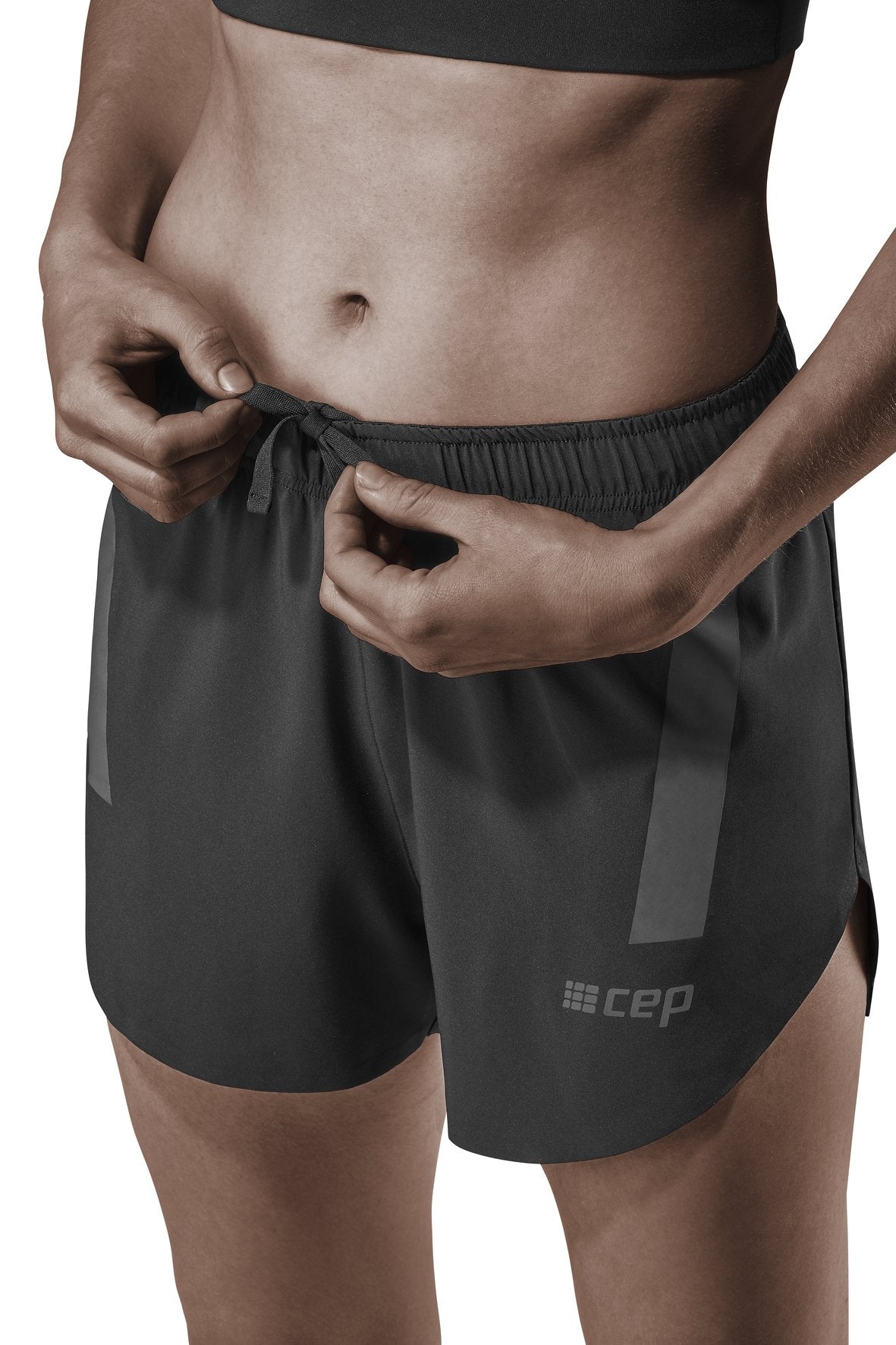 Women's CEP Race Loose Fit Shorts. Black. Front view.