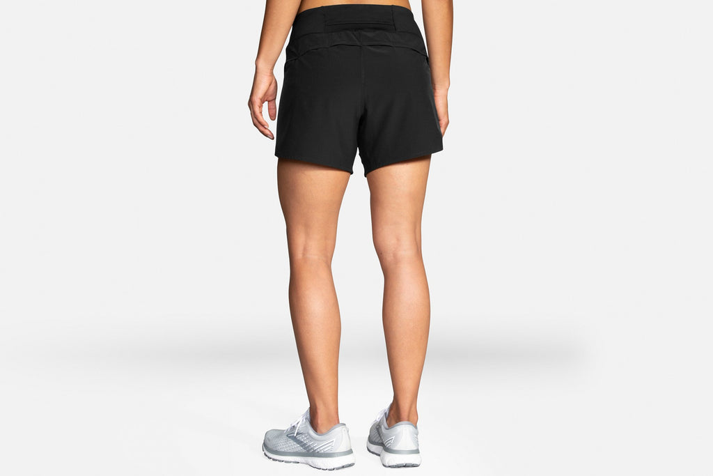 Women's Brooks Chaser 5" Shorts. Black. Rear view.