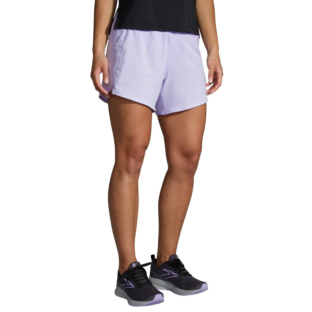 Women's Brooks Chaser 5" Shorts. Light purple. Front view.