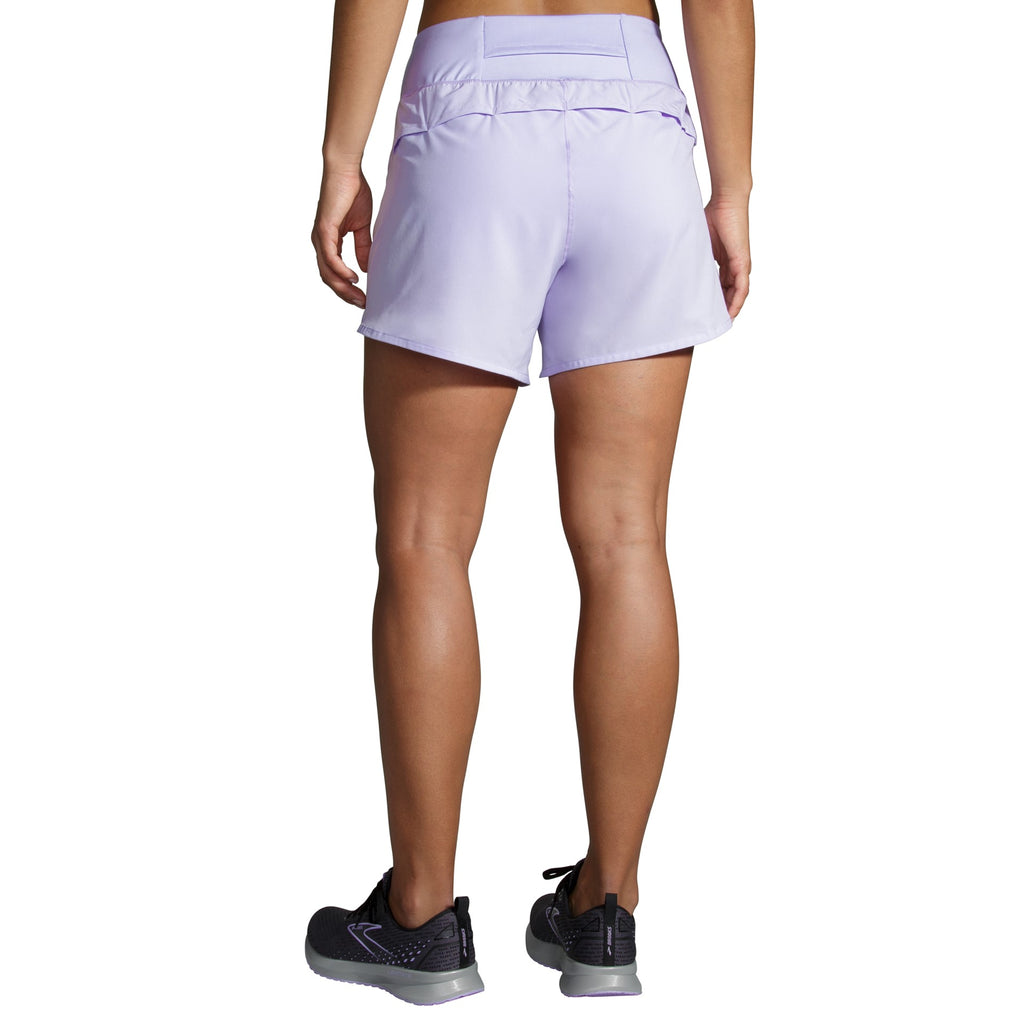 Women's Brooks Chaser 5" Shorts. Light purple. Rear view.