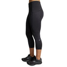 Women's Brooks Method 3/4 Tights. Black. Lateral view.