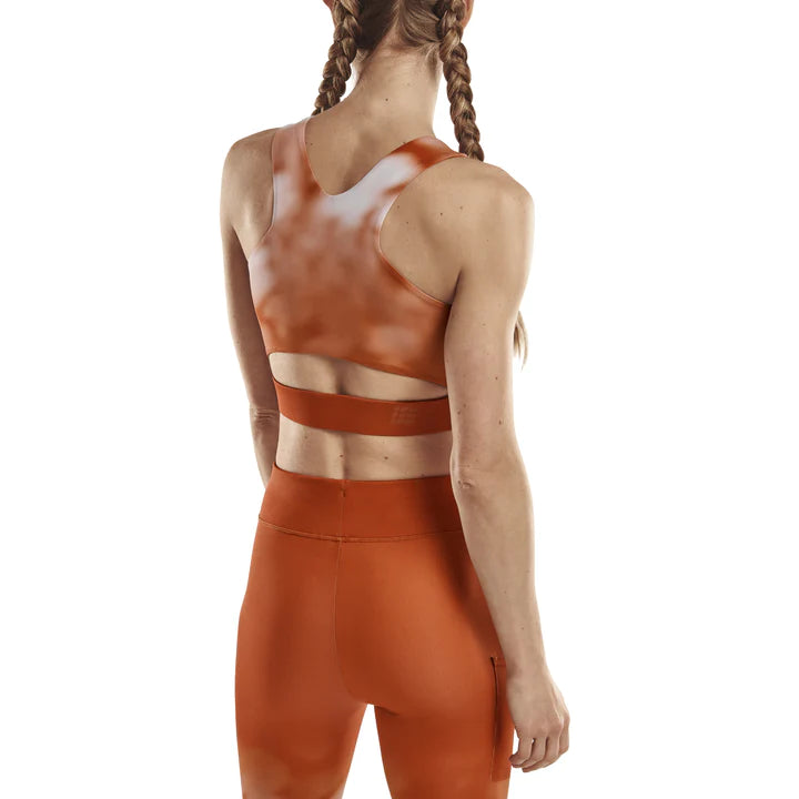 Women's CEP Bloom Crop Top. Orange/White. Rear view.