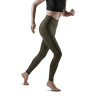 Women's CEP Reflective Tights. Green. Lateral view.