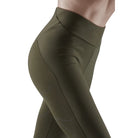 Women's CEP Reflective Tights. Green. Lateral view.